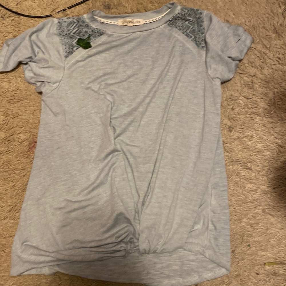 It is a rewind adult small full length light green tee.